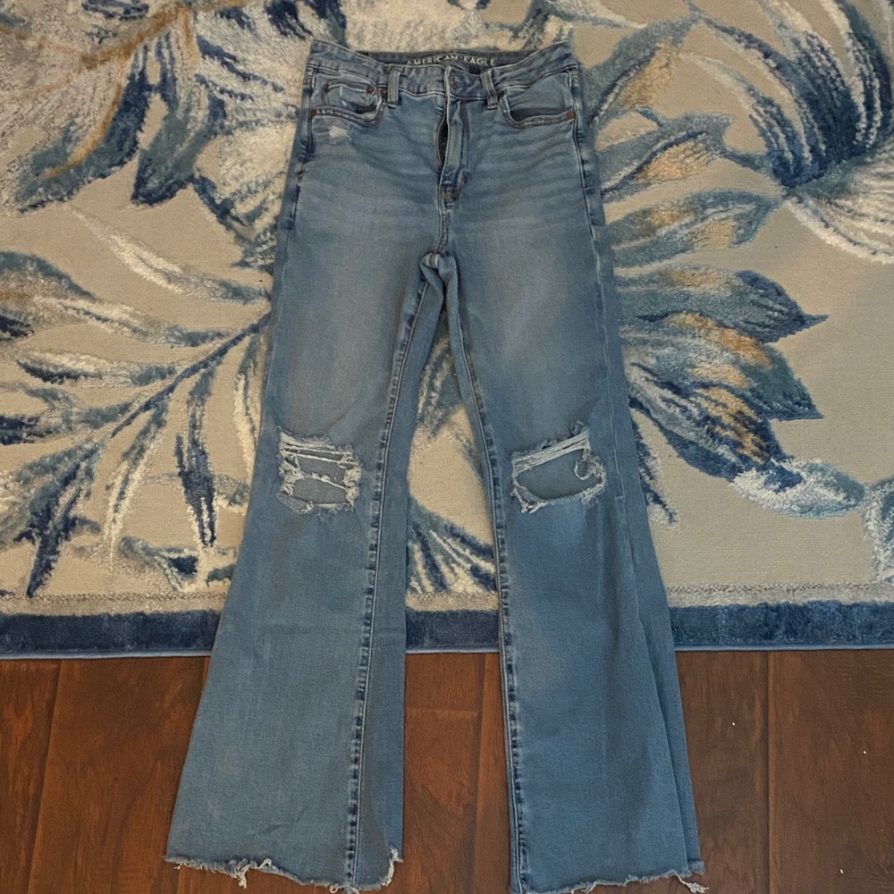 American Eagle Outfitters Light Blue ripped super high rise Flare Jeans
